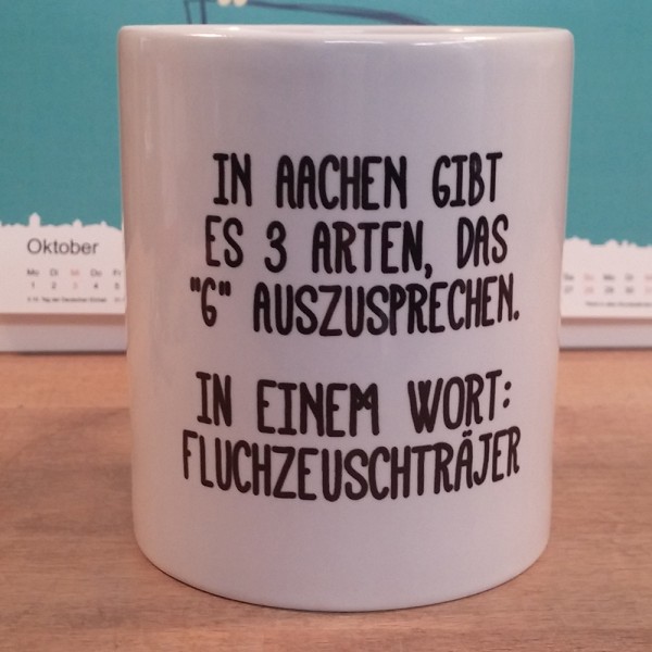 "FLUCHZEUSCHTRÄJER" - Tasse